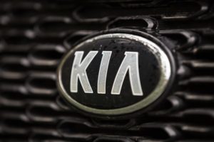 : KIA badge on the front of a car