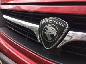 Proton badge on the front of a car