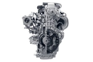 Modern car engine against a white background